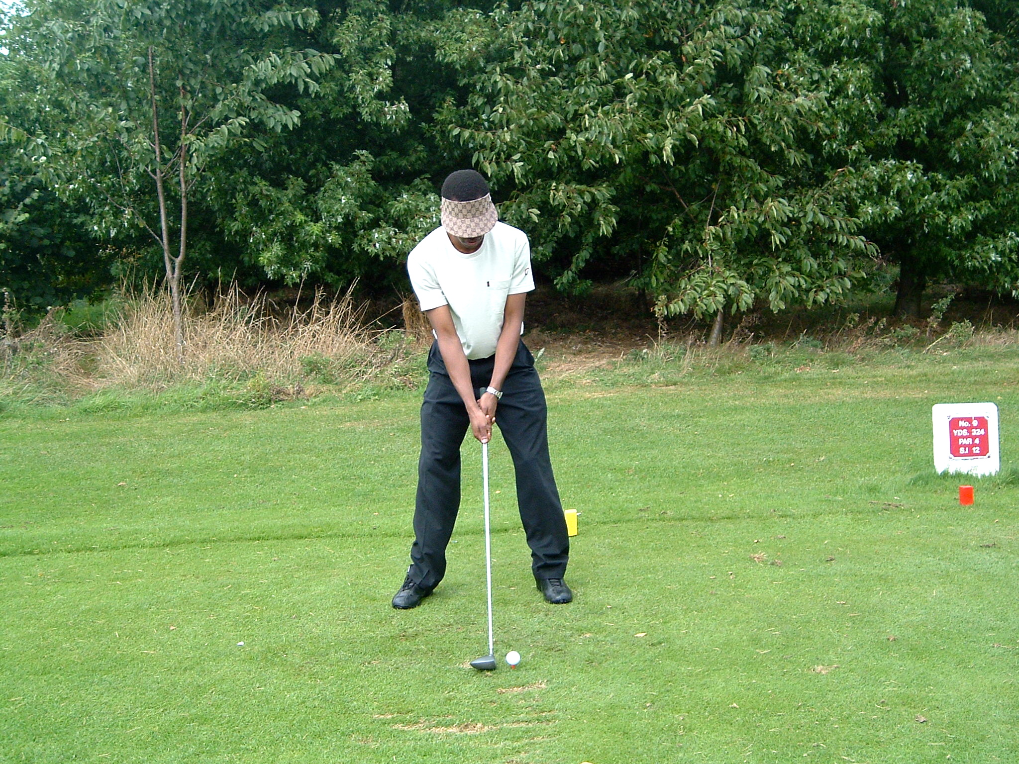 Jabu on the tee box at Stockwood Park, 2004 - first day of golf, Gucci cap and Air Jordans
